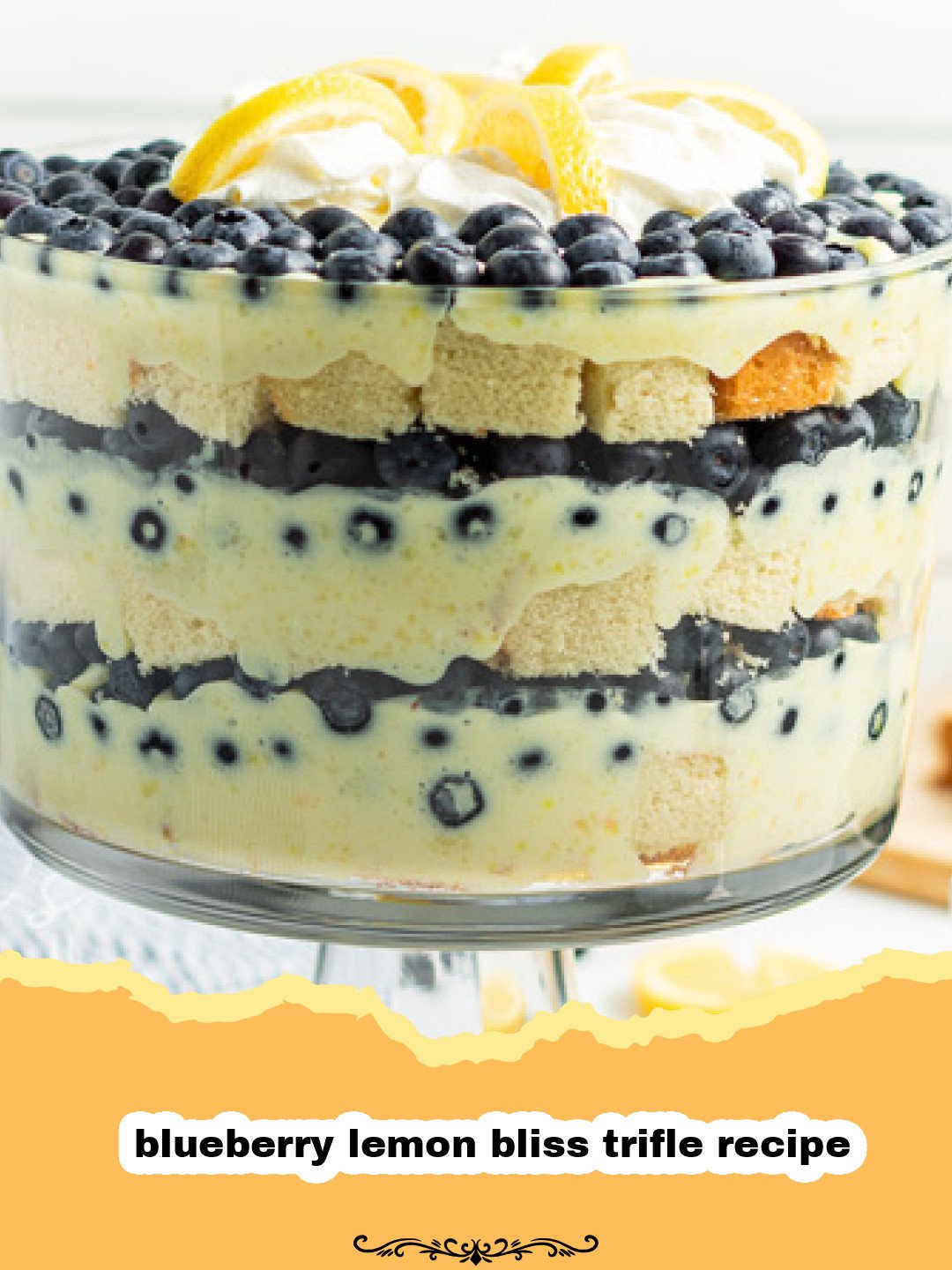 Divine Layers of Zest and Sweetness: The Ultimate Blueberry Lemon Bliss Trifle 3 Beautiful layered blueberry lemon bliss trifle in a clear glass dish, garnished with fresh blueberries and lemon slices.