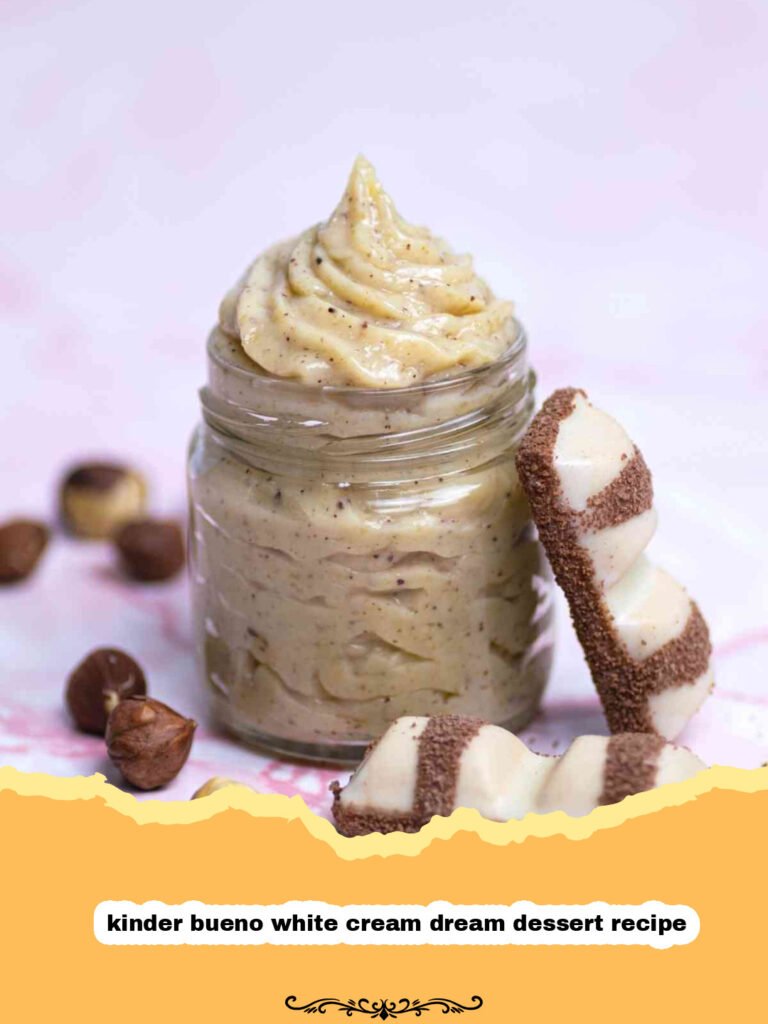 The Ultimate Kinder Bueno White Cream Dream Dessert: A No-Bake Delight! 5 A close-up of a square slice of Kinder Bueno White Cream Dream Dessert with layers visible and Kinder Bueno bars on top.
