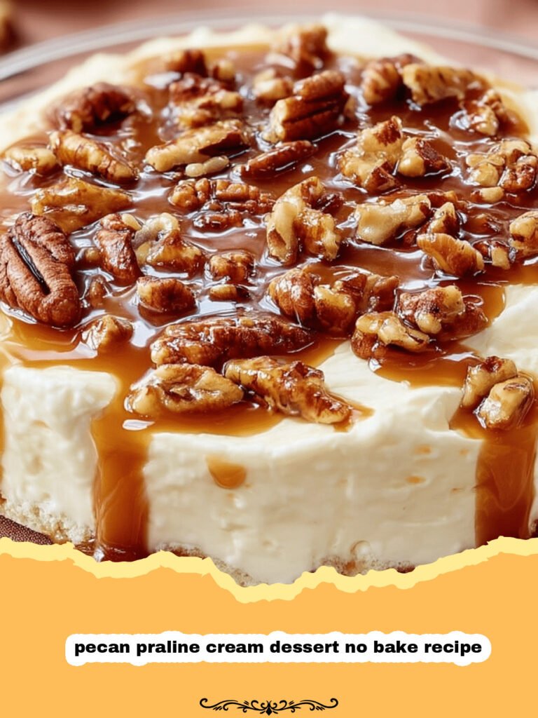 A beautiful glass serving dish filled with layers of no-bake pecan praline cream dessert, topped with extra praline and a drizzle of caramel.
