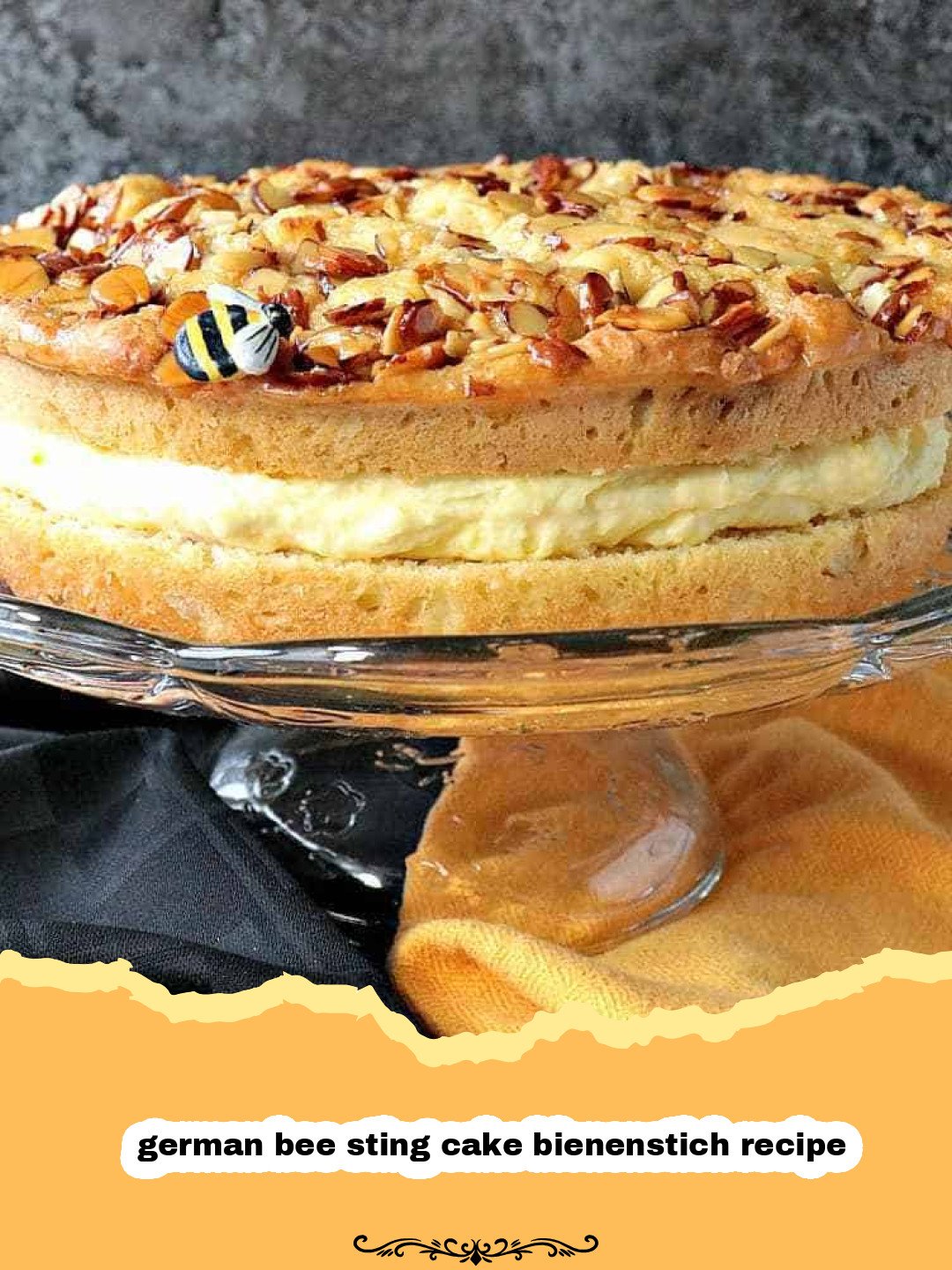 A glorious slice of German Bee Sting Cake (Bienenstich) with visible layers of light yeast cake, creamy vanilla custard, and a crunchy honey-almond topping.