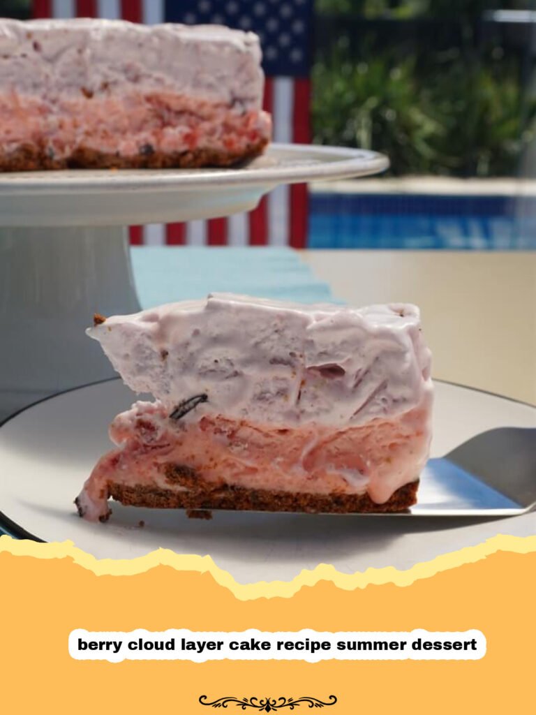 The Dreamiest Berry Cloud Layer Cake: Your Ultimate Summer Dessert Escape! 5 A beautifully frosted berry cloud layer cake, adorned with an abundance of fresh mixed berries, on a white cake stand.