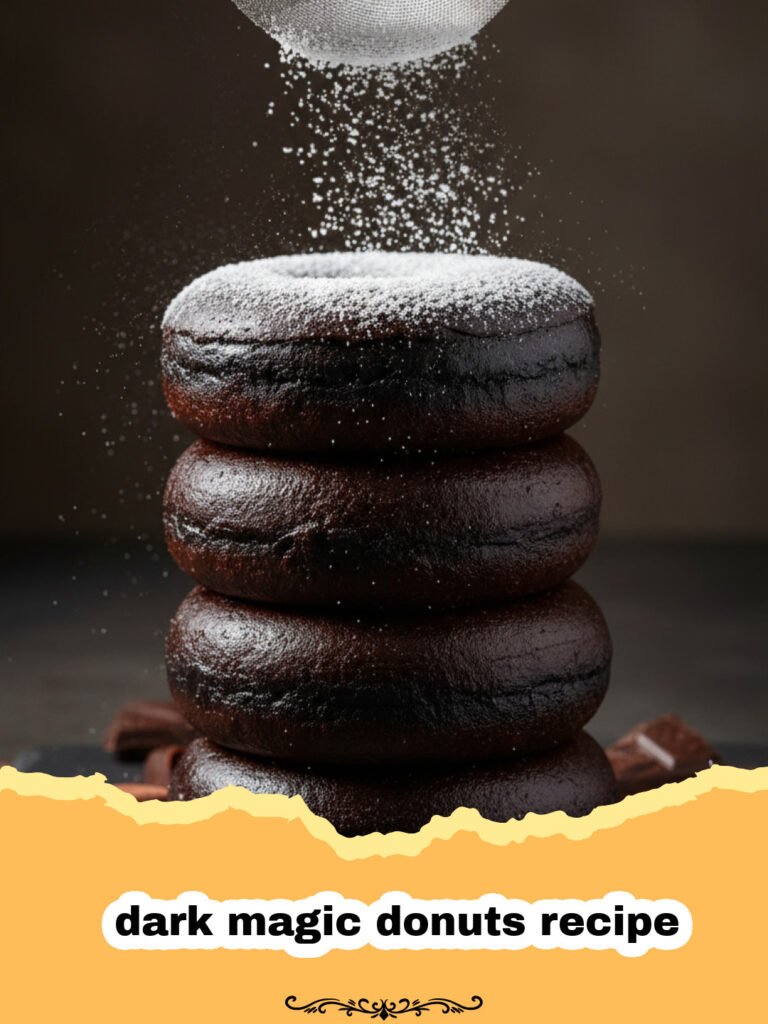 dark magic donuts recipe - A stack of deep dark chocolate donuts with a shiny chocolate glaze on a dark background.