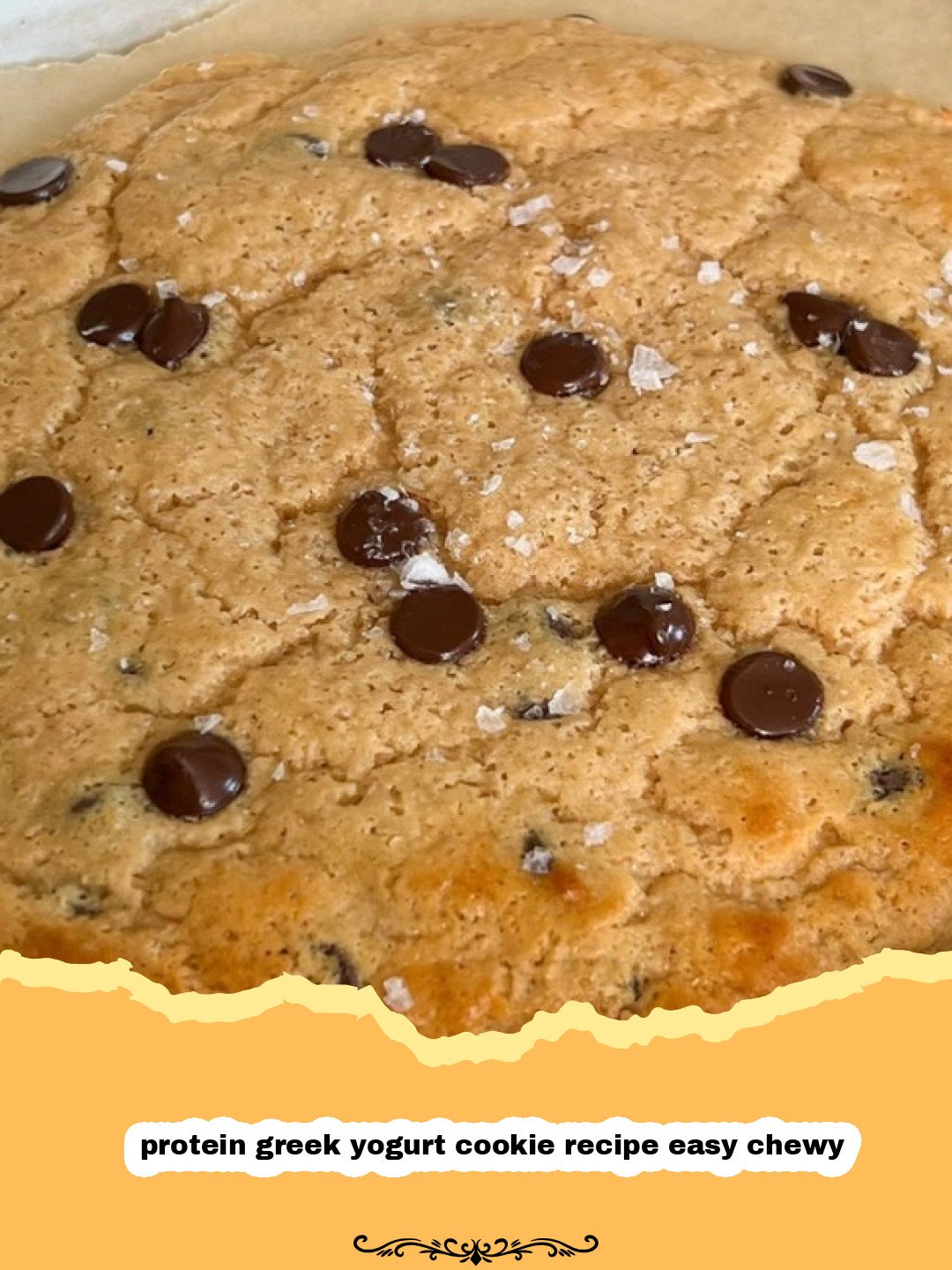 A stack of freshly baked, chewy protein Greek yogurt cookies with visible chocolate chips.