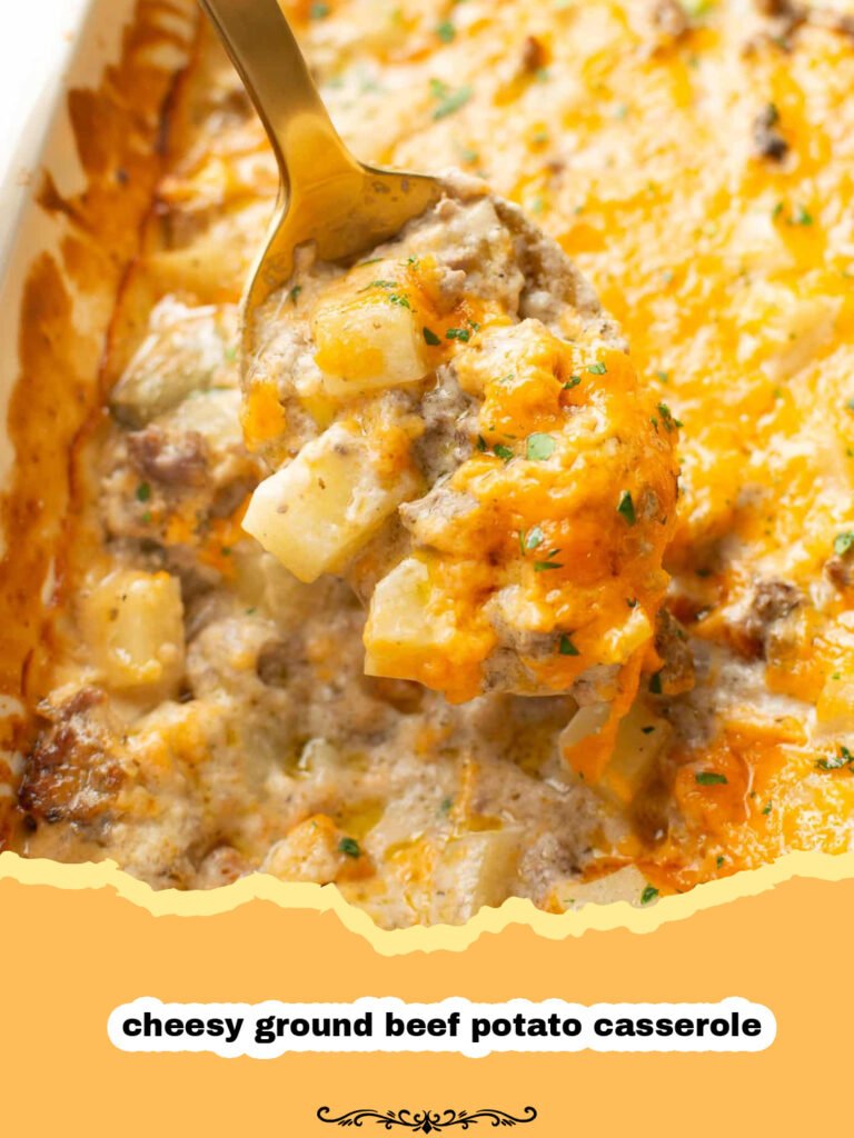 Close-up of a bubbling Cheesy Ground Beef Potato Casserole in a baking dish, with melted golden cheese and visible layers of potatoes and beef.