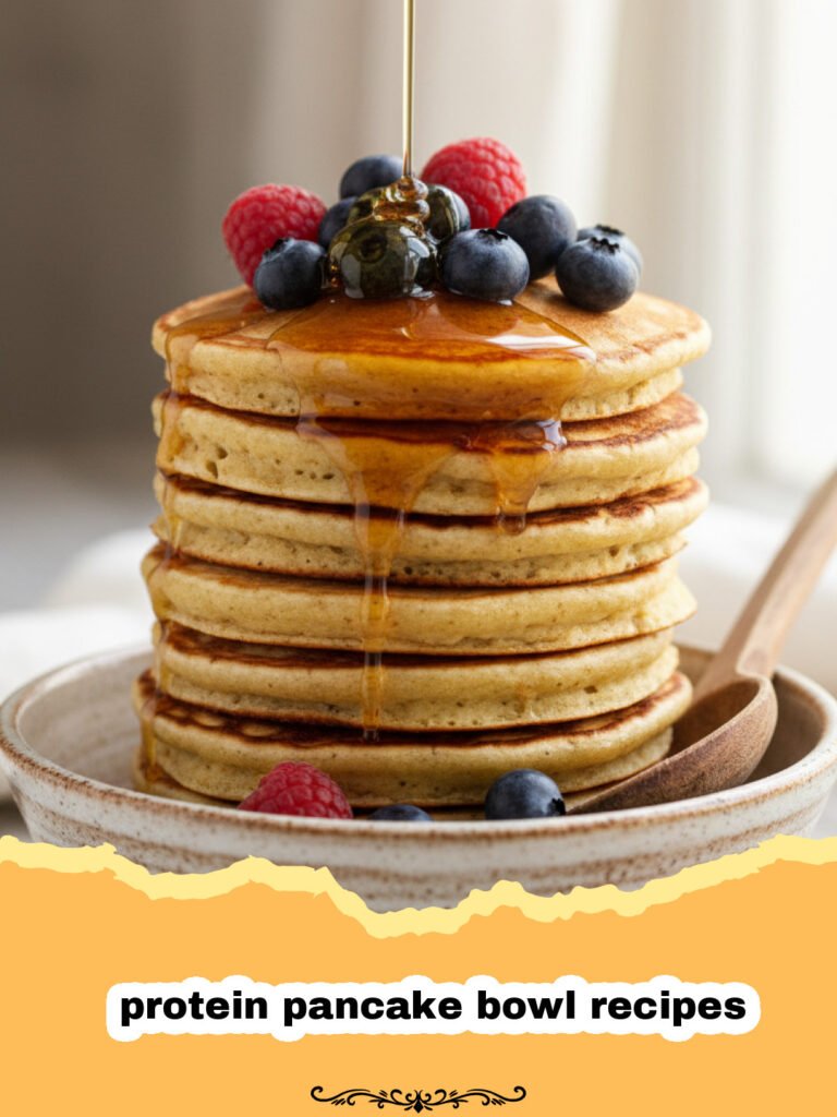The Ultimate Guide to Protein Pancake Bowl Recipes 5 protein pancake bowl recipes - A fluffy protein pancake bowl topped with fresh strawberries and a drizzle of peanut butter.