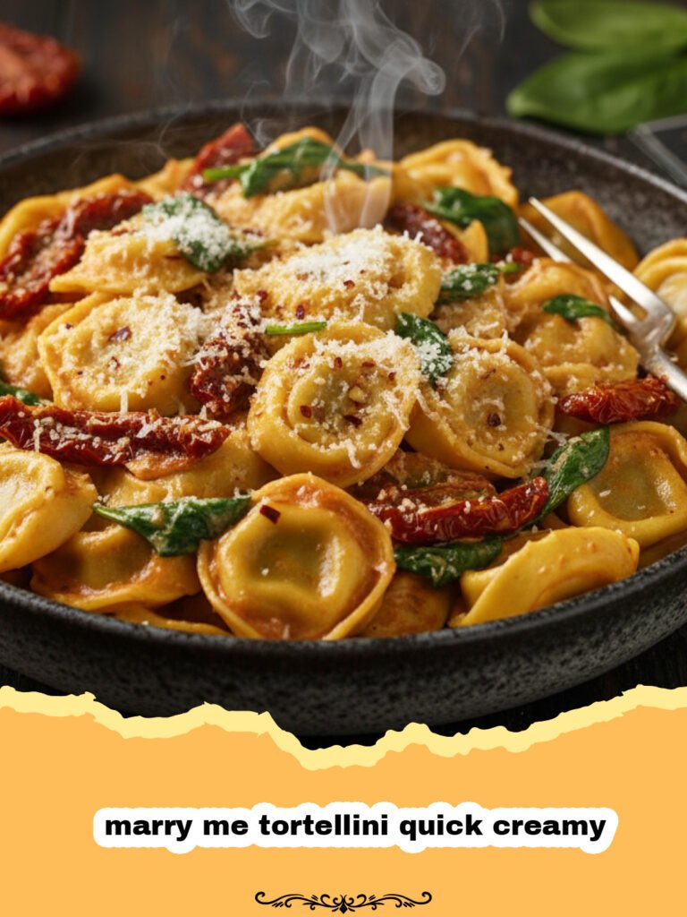 Close-up of a bowl of Marry Me Tortellini Quick Creamy with chicken, spinach, and sun-dried tomatoes, garnished with fresh parsley.