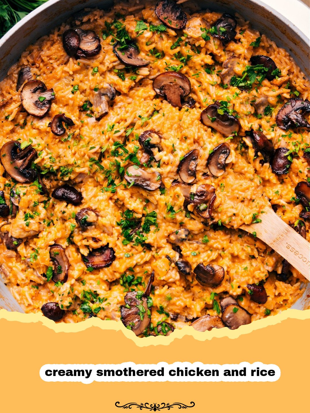 Close-up of creamy smothered chicken and rice in a skillet, garnished with fresh parsley.