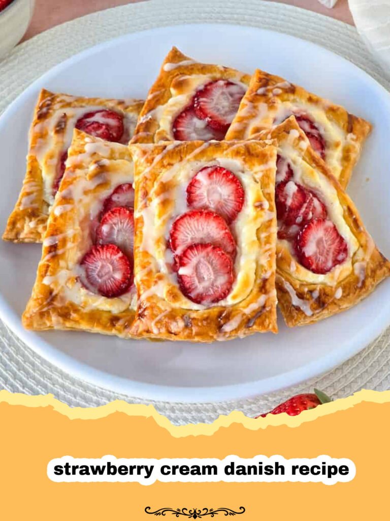 Indulge in Bliss: The Ultimate Strawberry Cream Danish Recipe 5 Close-up of a freshly baked strawberry cream danish with powdered sugar on a wire rack