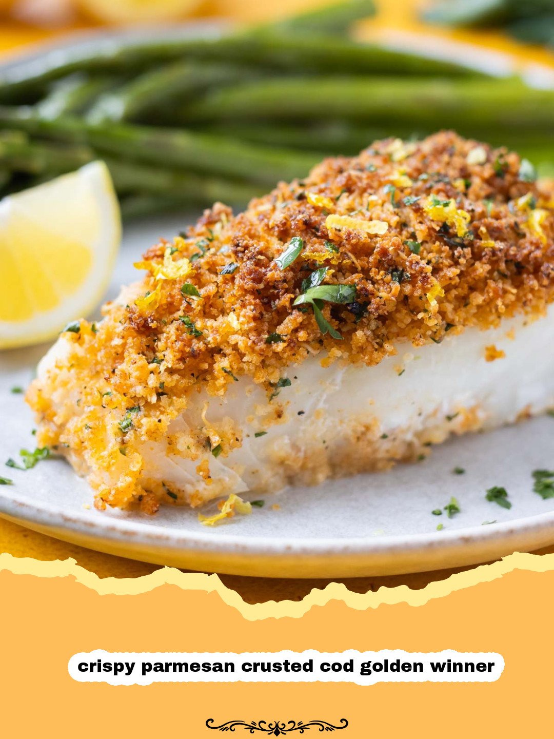Crispy Parmesan Crusted Cod fillets served with lemon wedges and fresh parsley on a white plate.
