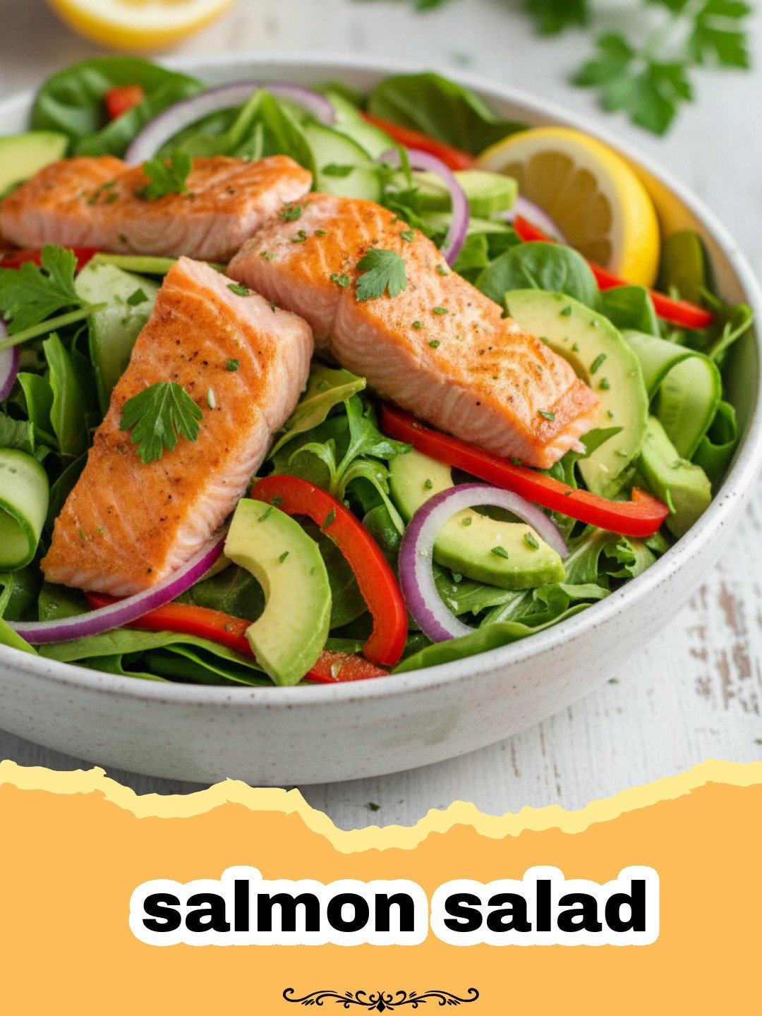 A close up bowl of fresh salmon salad with dill and lemon wedges