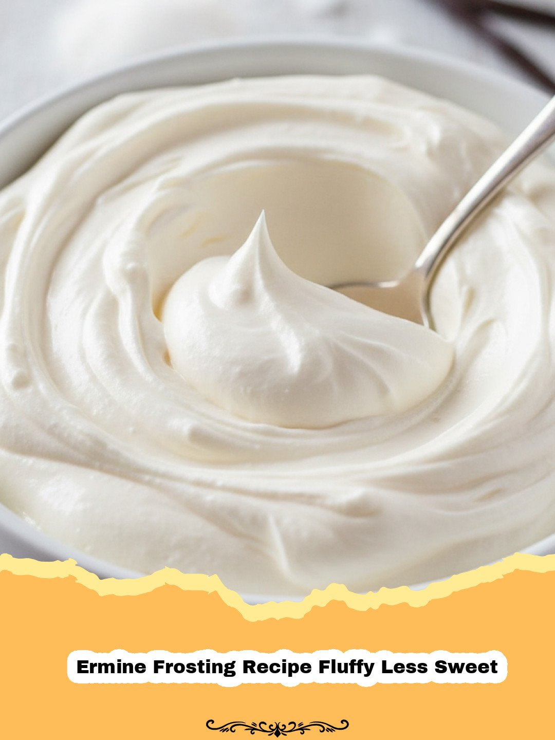 Ermine Frosting Recipe Fluffy Less Sweet - Close-up of a perfectly frosted cupcake with fluffy less sweet ermine frosting, showing its smooth, light texture.