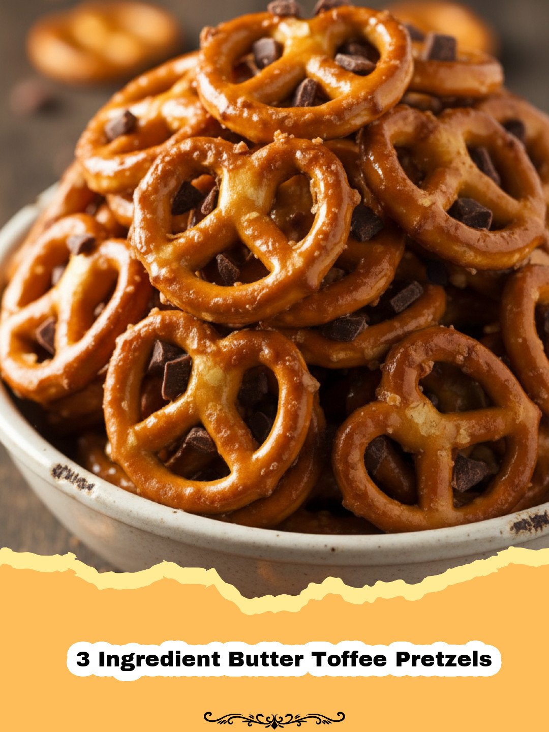 A close-up shot of golden-brown 3 Ingredient Butter Toffee Pretzels scattered on a parchment-lined baking sheet, glistening with caramelized toffee.