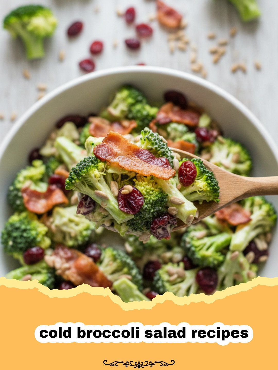 cold broccoli salad recipes - A vibrant bowl of classic cold broccoli salad with bacon, red onion, sunflower seeds, and cranberries in a creamy dressing.