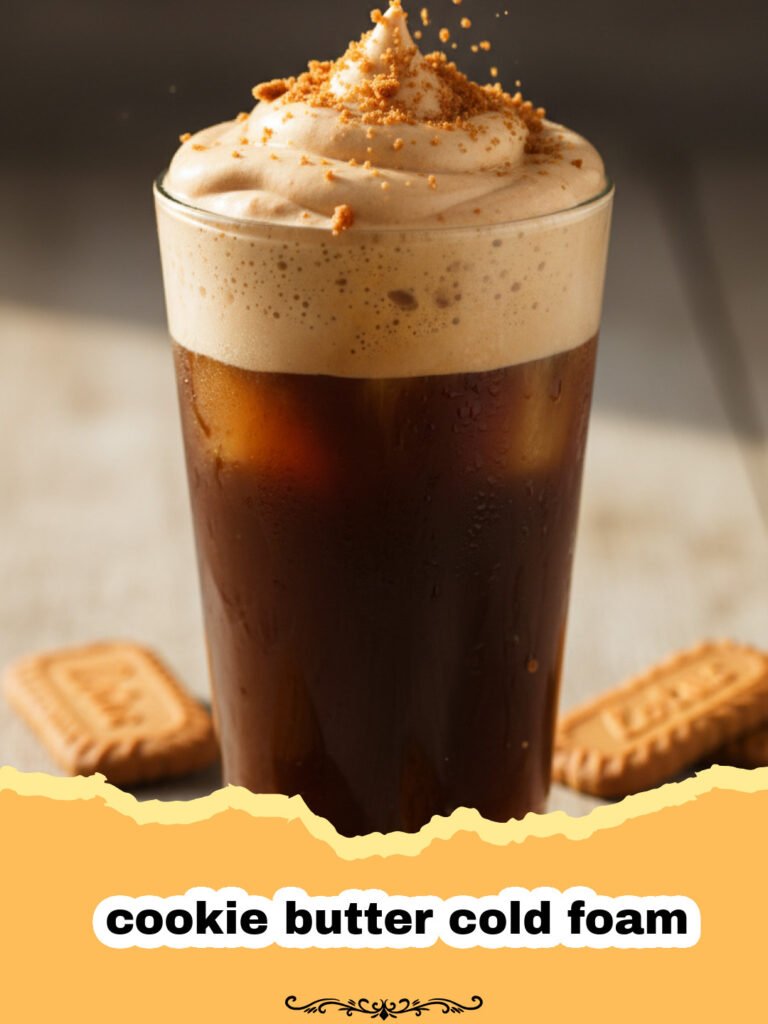 Unlock Coffee Bliss: The Irresistible Cookie Butter Cold Foam Recipe 5 A glass of iced coffee topped with fluffy, golden-brown cookie butter cold foam, garnished with a sprinkle of cinnamon.