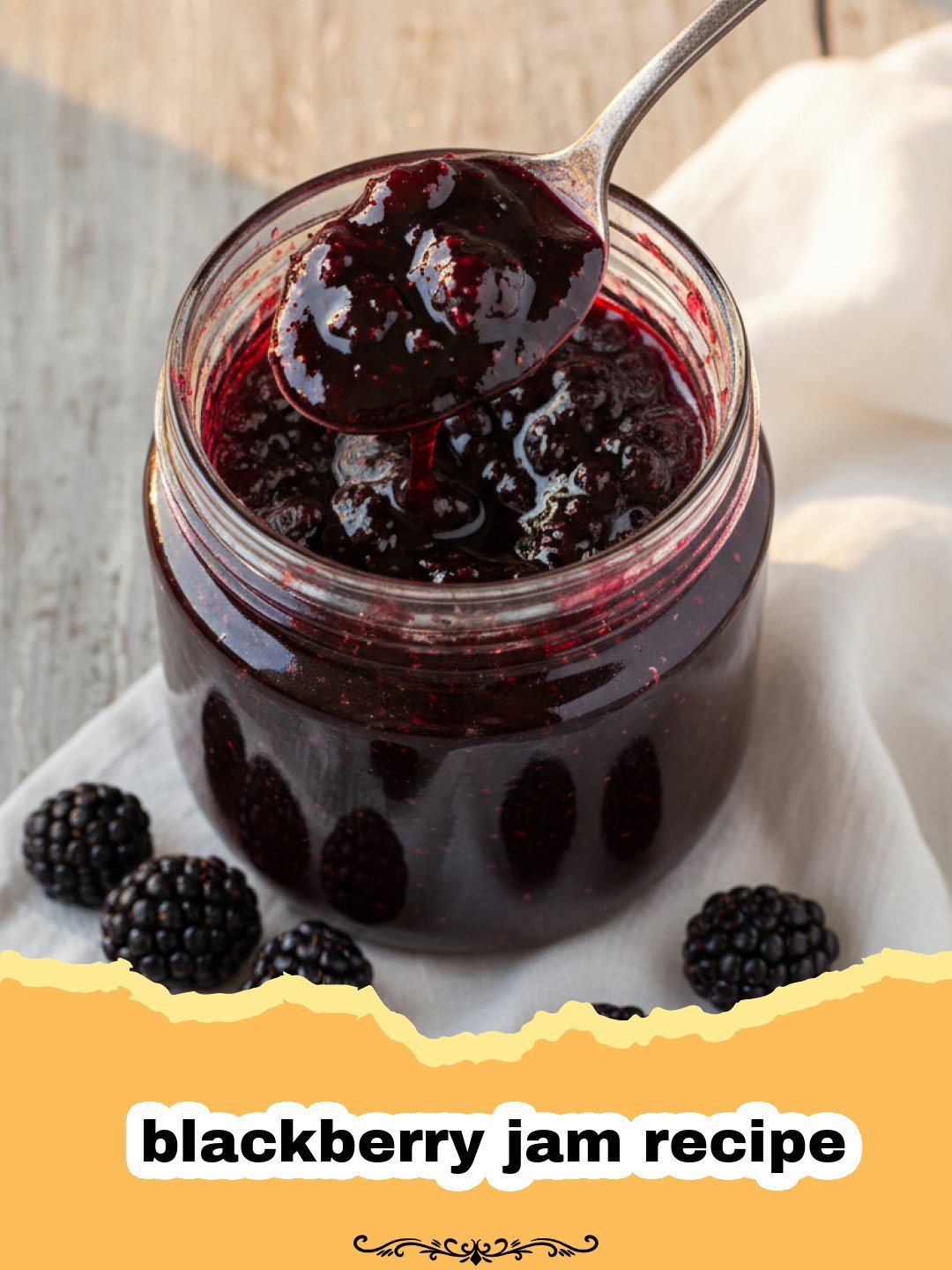 blackberry jam recipe - Several jars of homemade blackberry jam with fresh blackberries and leaves scattered around.