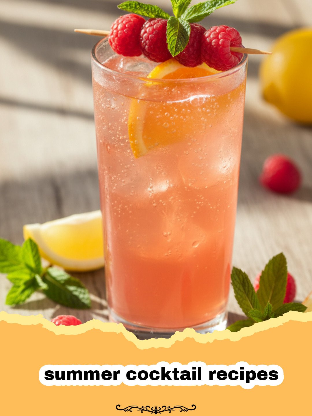 summer cocktail recipes - Vibrant Sparkling Berry Basil Spritzer with fresh berries, basil, and lemon slices in a tall glass.