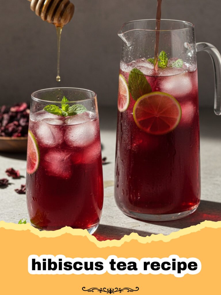 hibiscus tea recipe - A glass pitcher of deep red hibiscus tea with lime slices and mint garnish