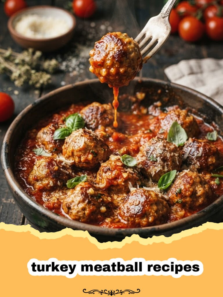 turkey meatball recipes - Close-up of golden-brown turkey meatballs in a skillet, garnished with fresh parsley.