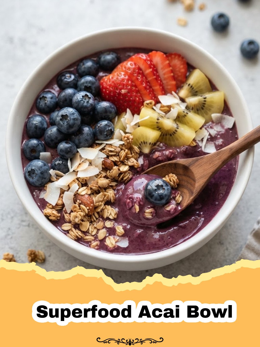 The Ultimate Guide to Crafting the Perfect Superfood Acai Bowl at Home 3 A beautifully arranged Superfood Acai Bowl with granola, fresh berries, sliced banana, and shredded coconut.