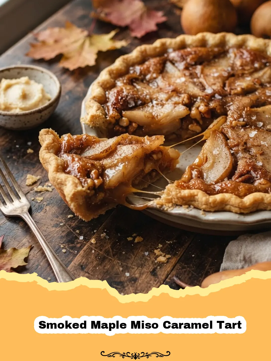 A slice of Smoked Maple Miso Caramel Tart with a rich, glossy caramel filling and toasted pecans on a shortbread crust.