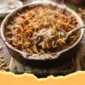 Close-up of a bubbling One Pot French Onion Casserole with golden brown cheese on top, served in a Dutch oven.